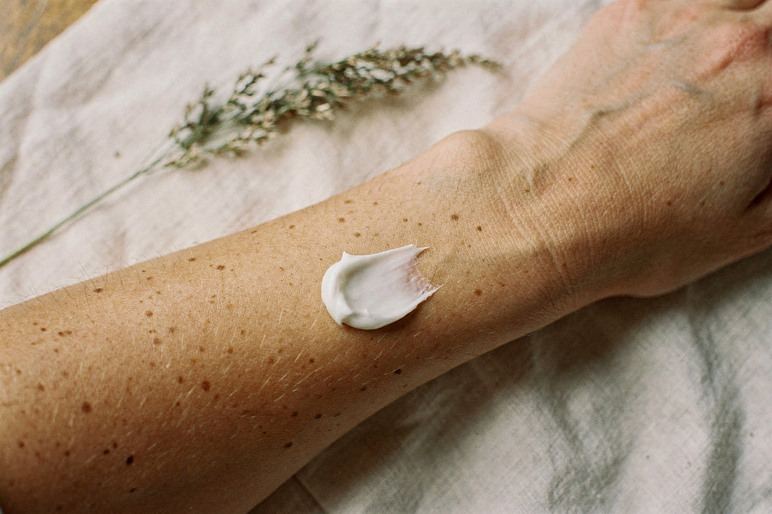 Whipped beef tallow body butter applied to the inside of a forearm
